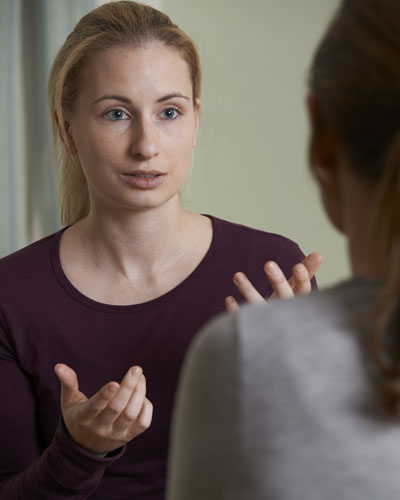 client talking with staff member